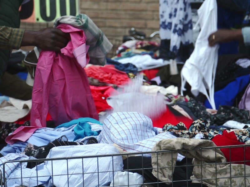 Choosing fabric at the market