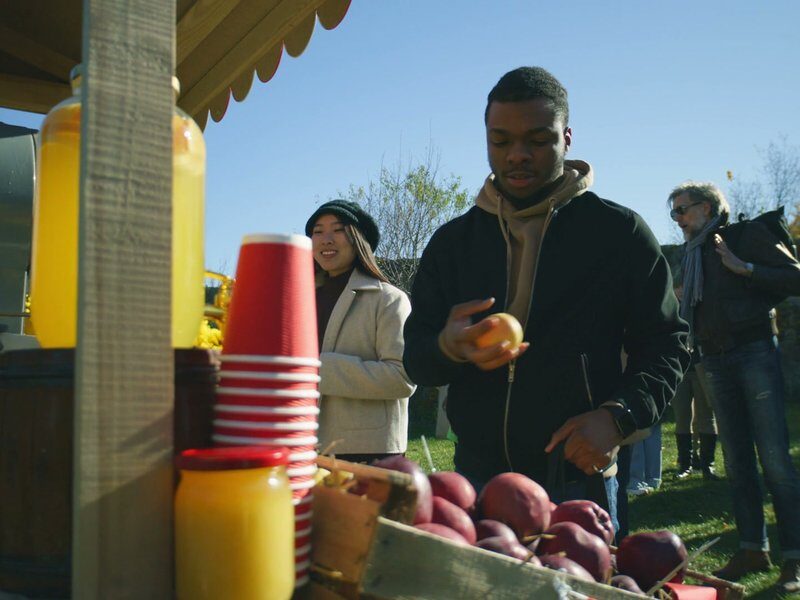 Couple choosing products at a vendor stall